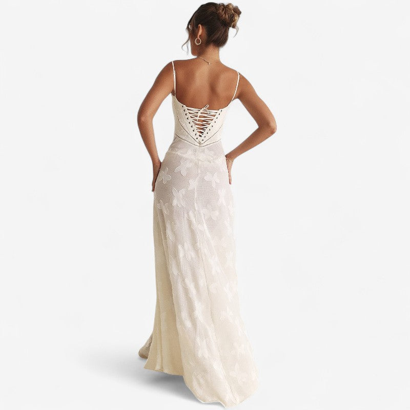 Nova – Mouwloze lange jurk met open rug en bloemenprint Velani