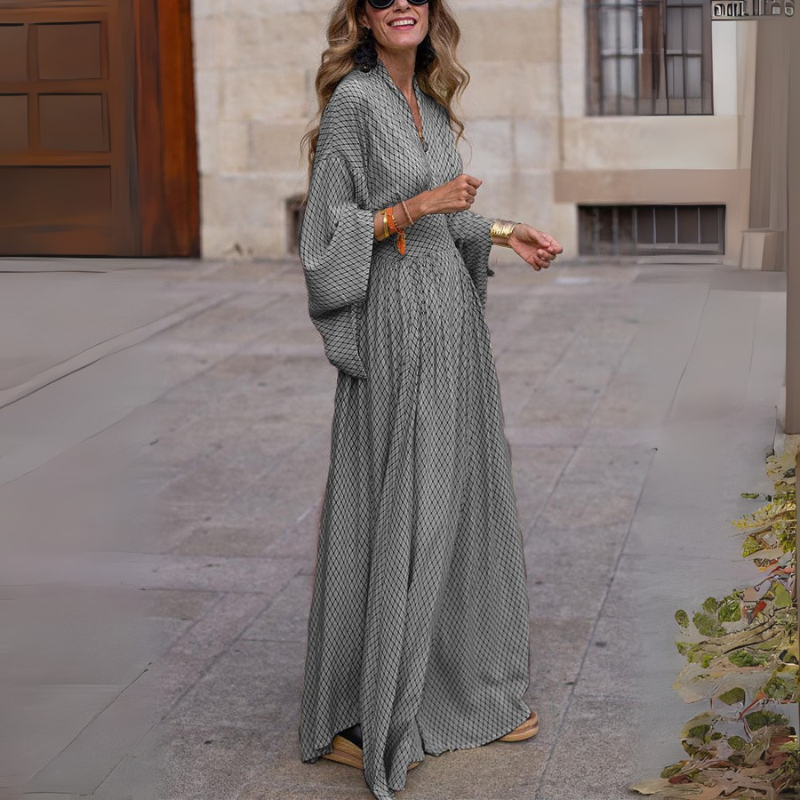 Nora – Lange maxi-jurk met wijde mouwen en geruit patroon Velani