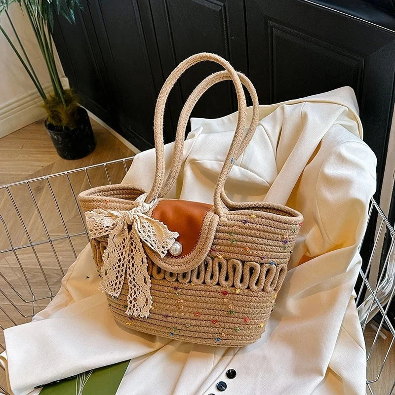 Esmee – Handtas met Grote Inhoud en Decoratieve Strik Velani