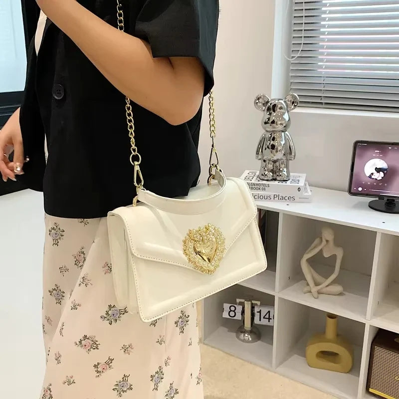 Sarah – Handtas met verstelbare band en hartsluiting Velani