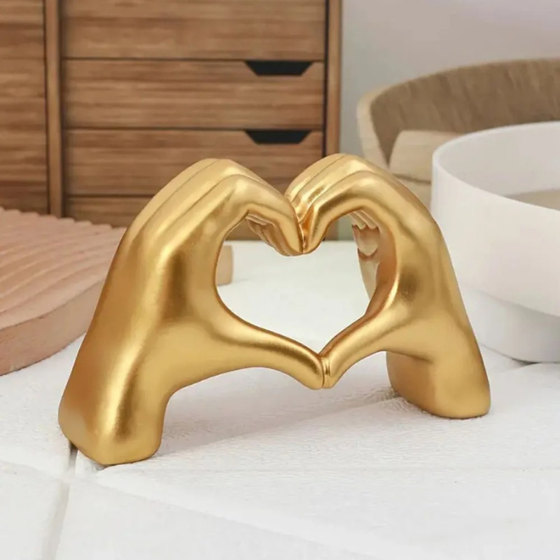 HeartAura – Heart Figurine with Finger-Heart Design