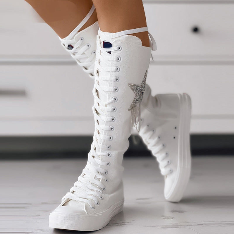 Clara – High boots with lace-up and flat sole design