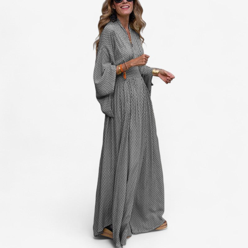 Nora – Lange maxi-jurk met wijde mouwen en geruit patroon Velani