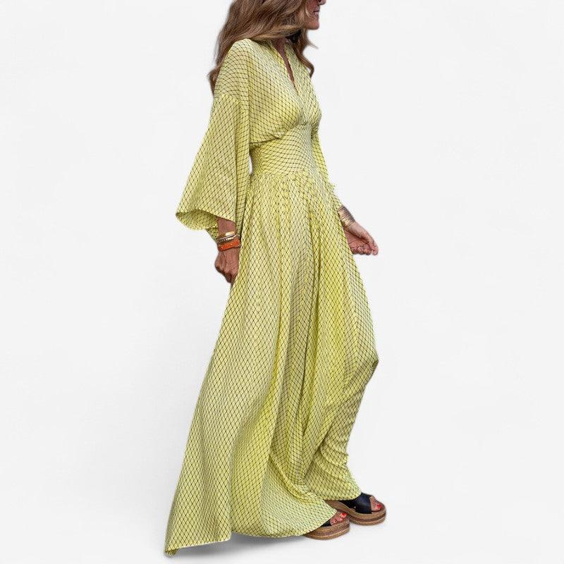 Nora – Lange maxi-jurk met wijde mouwen en geruit patroon Velani