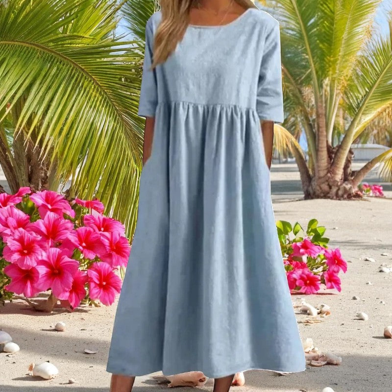 Olivia – Losvallende Lange Jurk met Korte Mouwen Velani