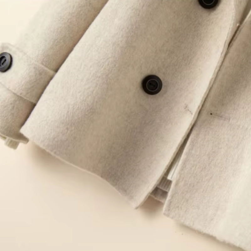 Maria – Jas met lange mouwen, reverskraag en knopen Velani