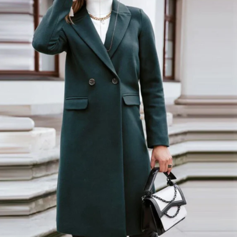 Rebecca – Lange jas met reverskraagknoopmouwen en zakken Velani