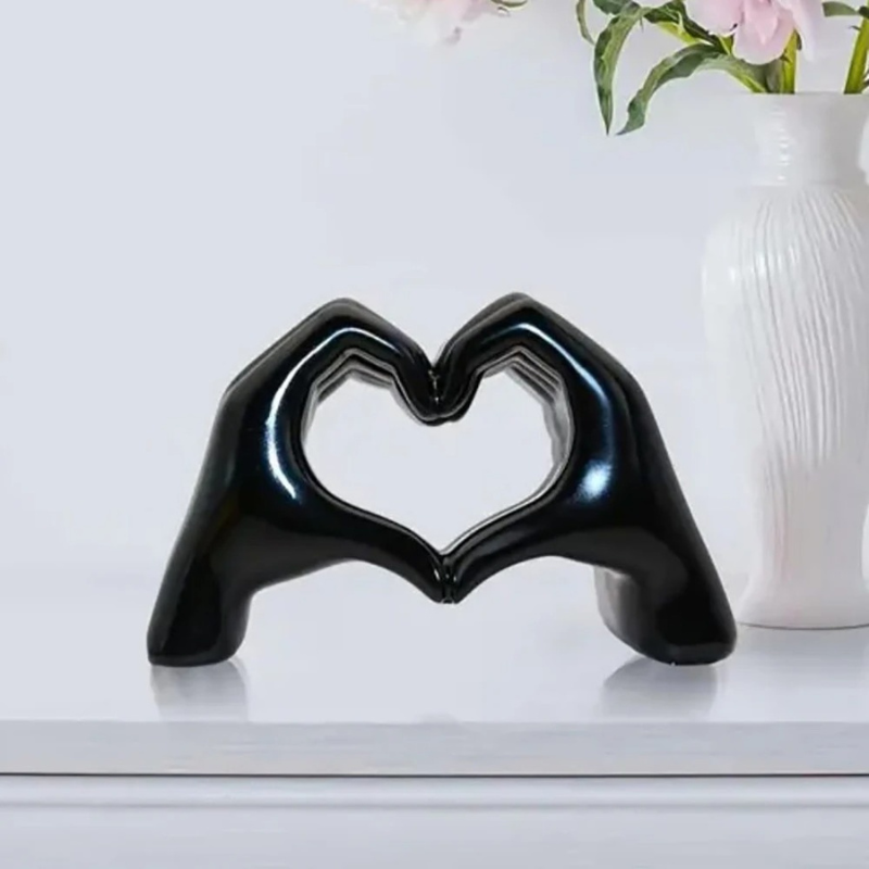 HeartAura – Heart Figurine with Finger-Heart Design