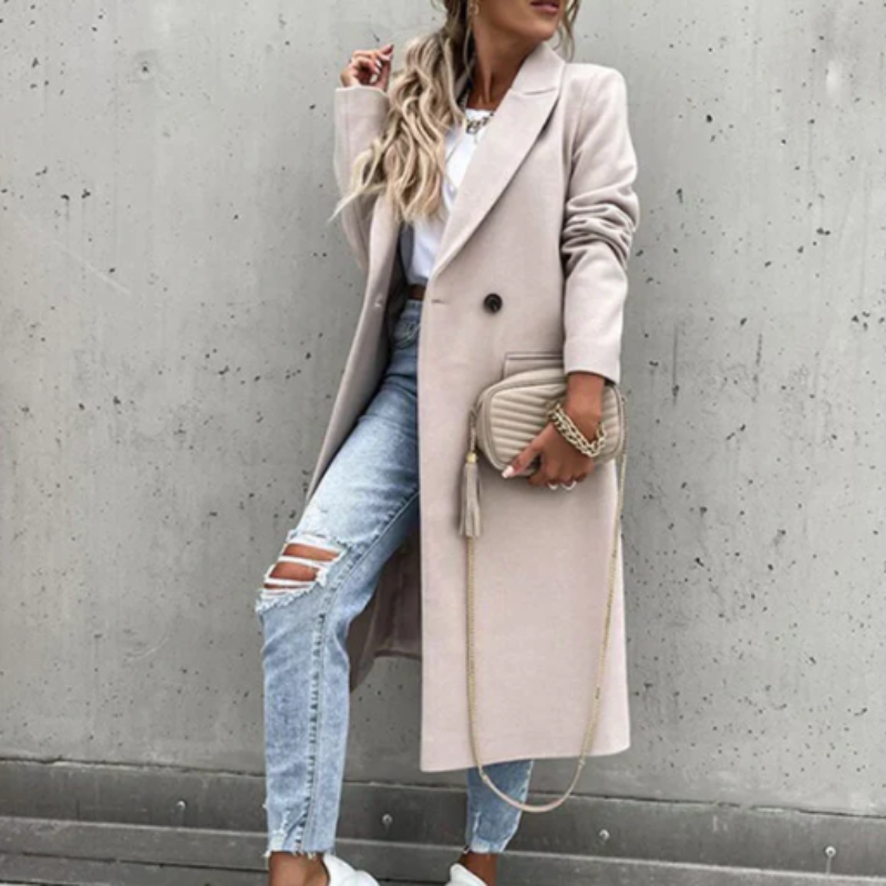 Rebecca – Lange jas met reverskraagknoopmouwen en zakken Velani
