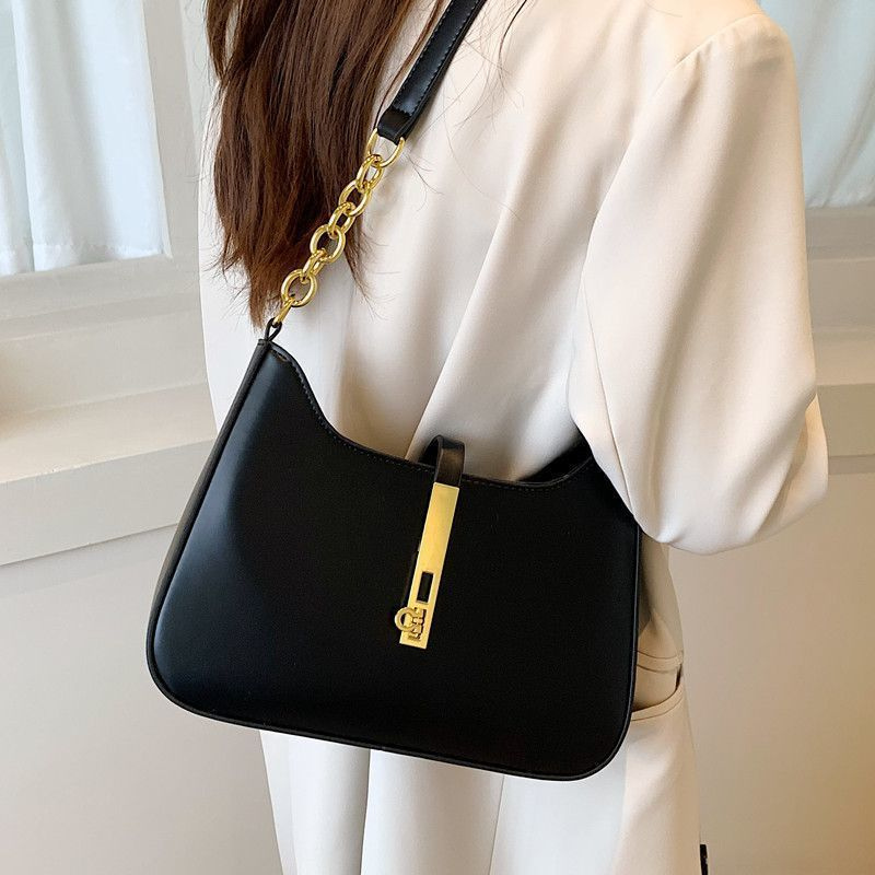 Imogen – Compact Shoulder Bag with Adjustable Strap & Buckle Closure