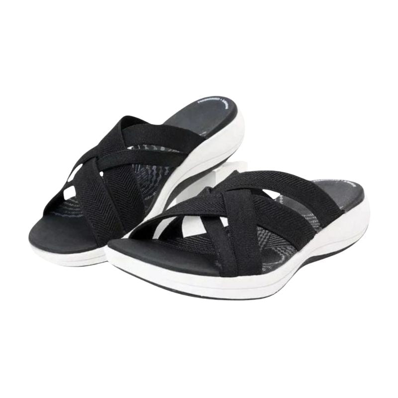 Nora – Dikke Slippers met Brede Kruisband en Open Teen Velani