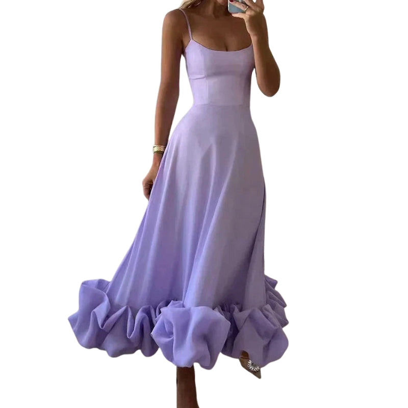 Greta – Mouwloze Midi-jurk met Spaghettibandjes Velani