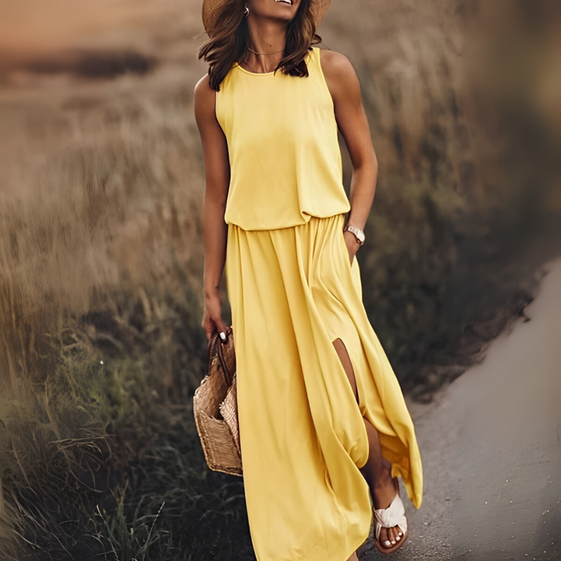 Elsie – Lange Mouwloze Jurk met Zijsplit Ronde Hals en Off-Shoulder Design Velani