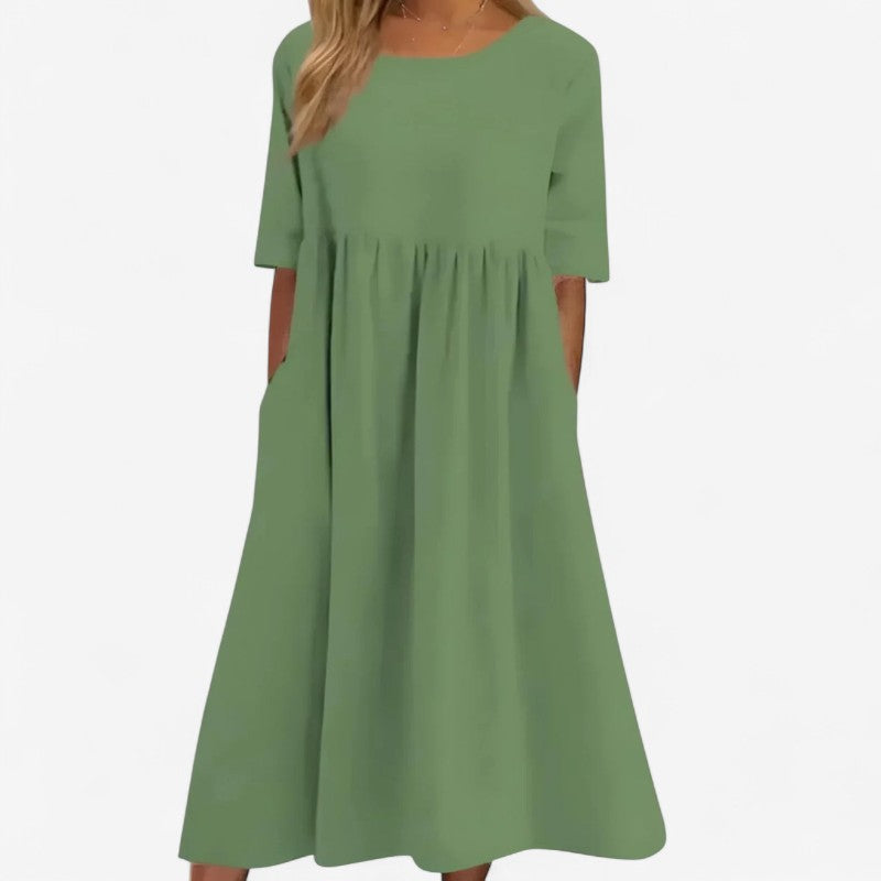 Olivia – Losvallende Lange Jurk met Korte Mouwen Velani