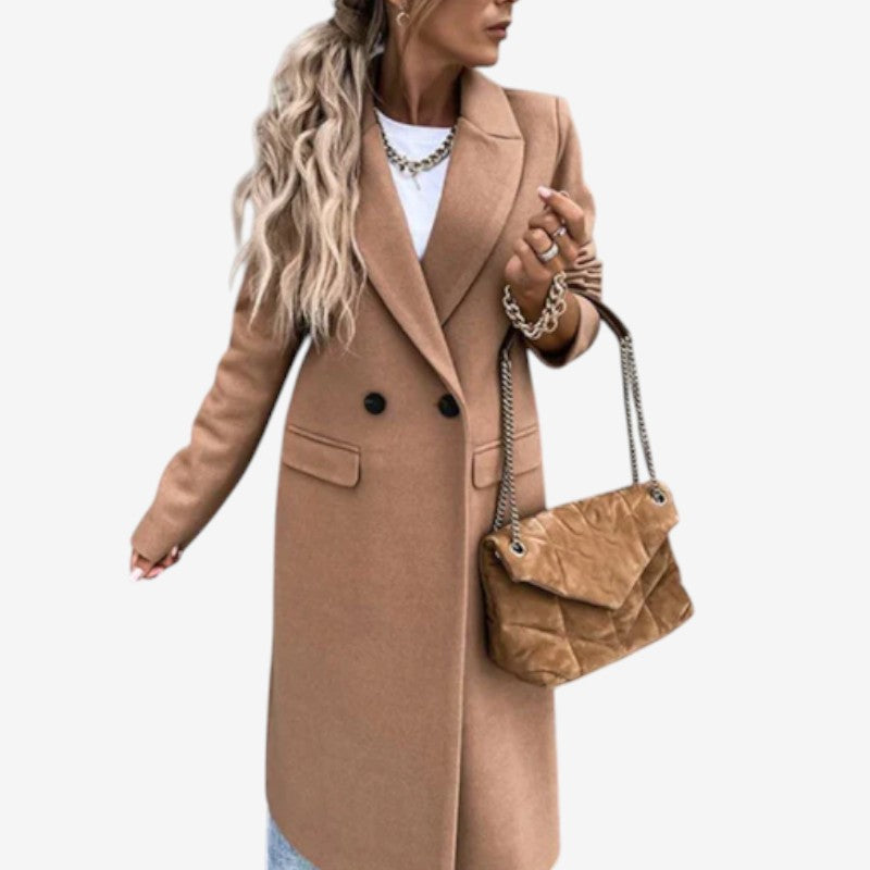 Rebecca – Lange jas met reverskraagknoopmouwen en zakken Velani