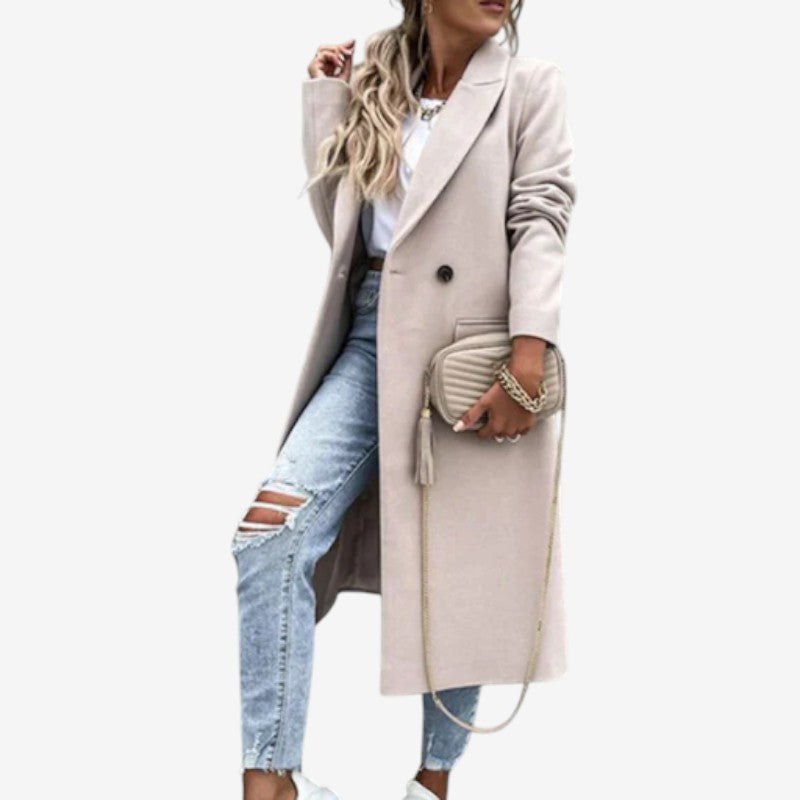 Rebecca – Lange jas met reverskraagknoopmouwen en zakken Velani