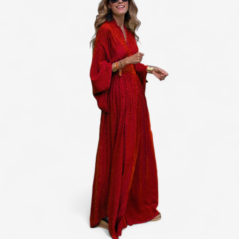 Nora – Lange maxi-jurk met wijde mouwen en geruit patroon Velani